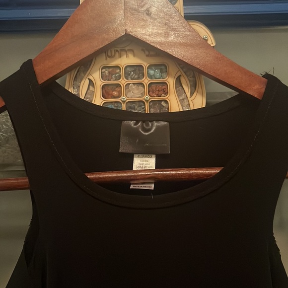 Black sexy mini dress fitted with holes throughout sleeves very unique. - Picture 3 of 5